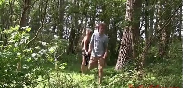 Young guy fucks an adult lady with beautiful boobs right in the forest